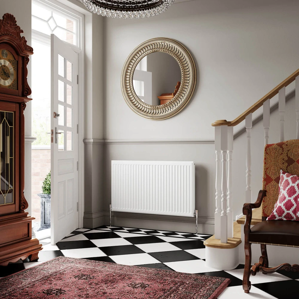 Deskový radiátor Classic Compact 600 × 1100 mm, 1078 W,  Typ 11,  barva bílá,  připojení boční,  horní mřížka,  úchyty vč. konzolí a příslušenství (EVC1161101078)